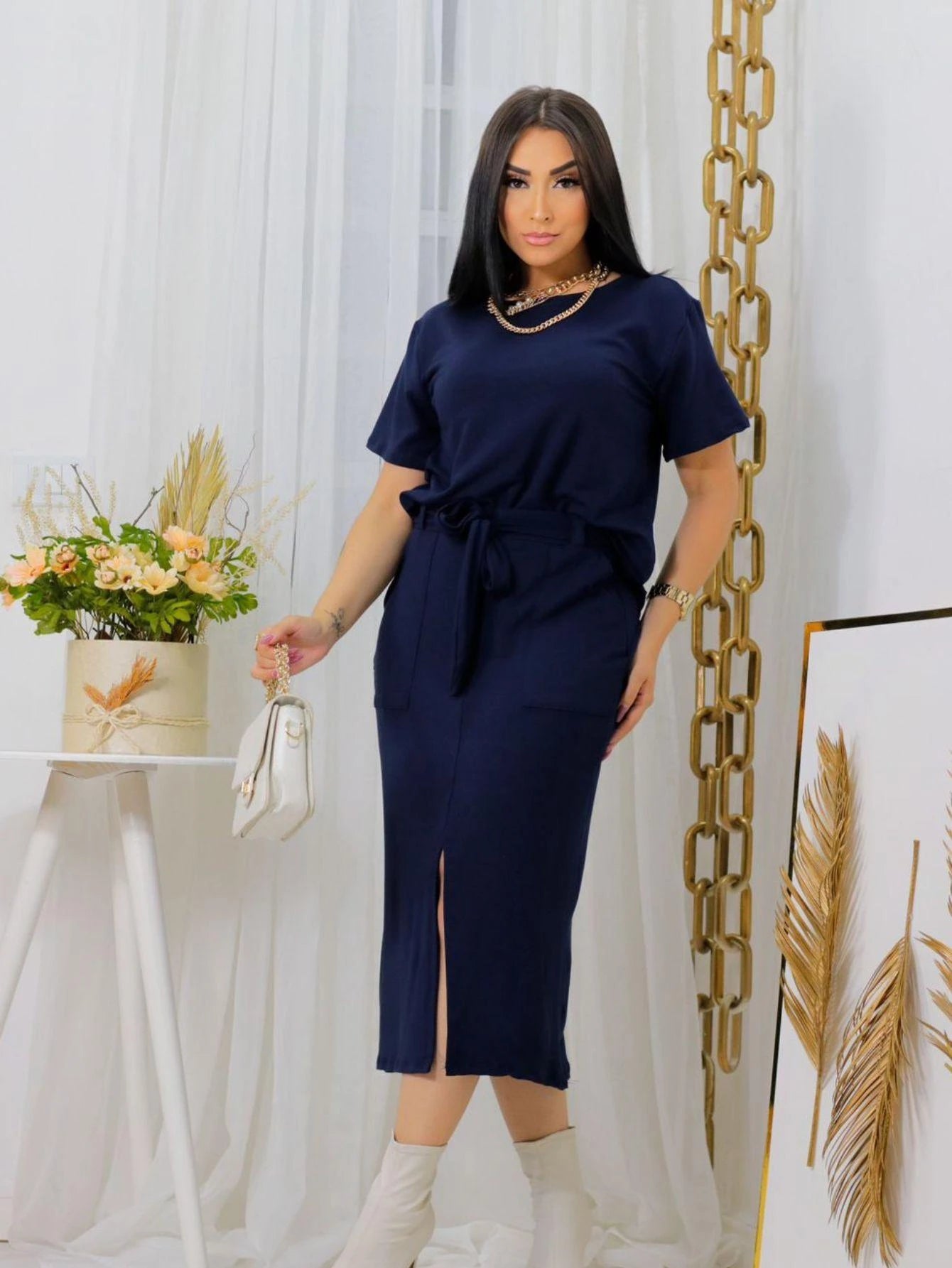 Conjunto feminino de blusa manga curta e saia midi com fenda frontal em moletinho